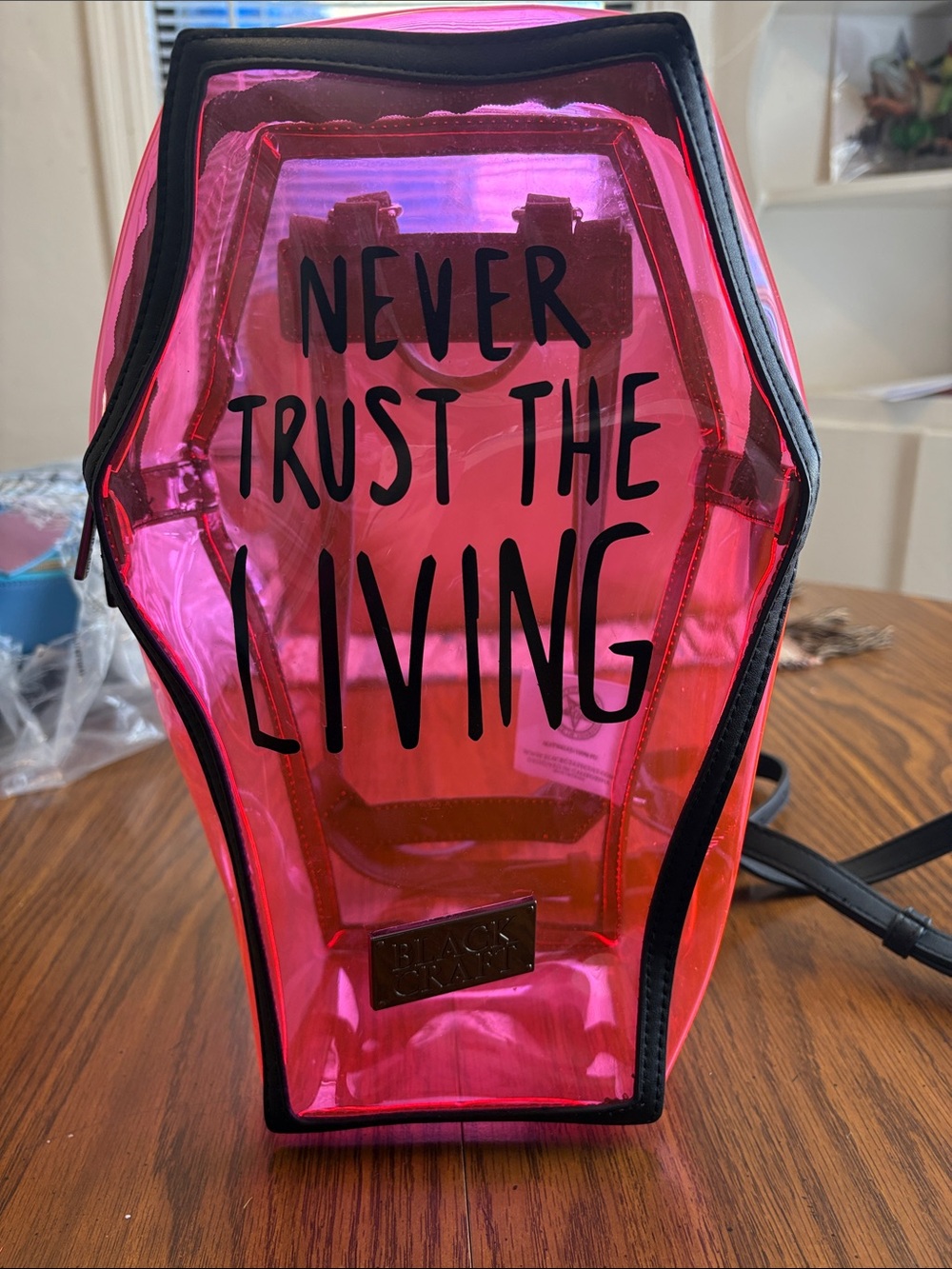 Never Trust The Living Pink Coffin Crossbody Bag